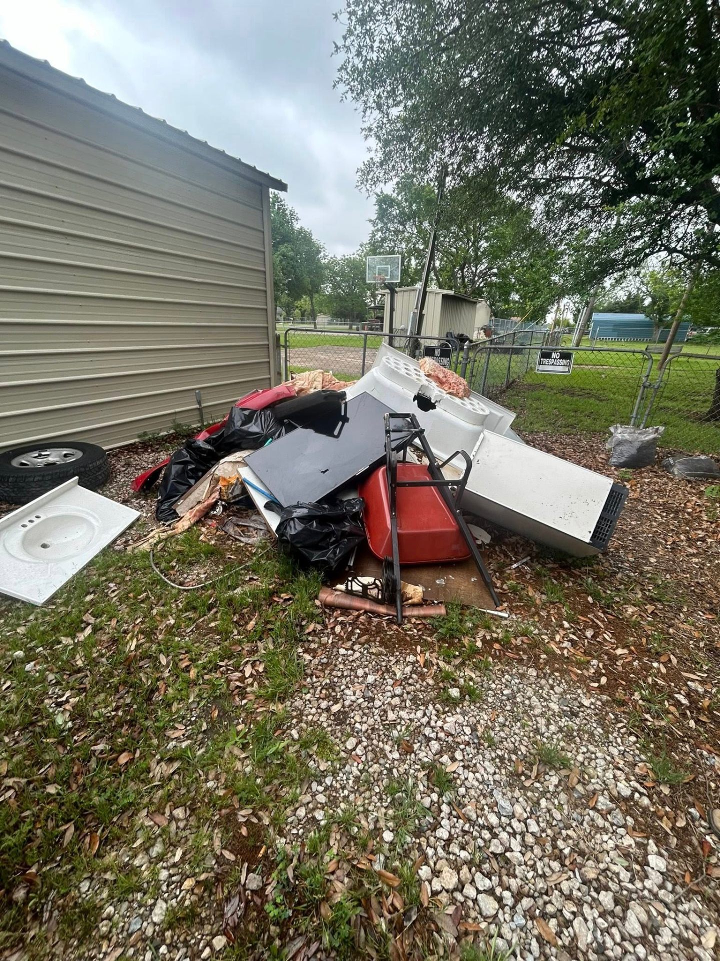 Pile of household junk, appliances and debris before AJ Solutionz cleanout